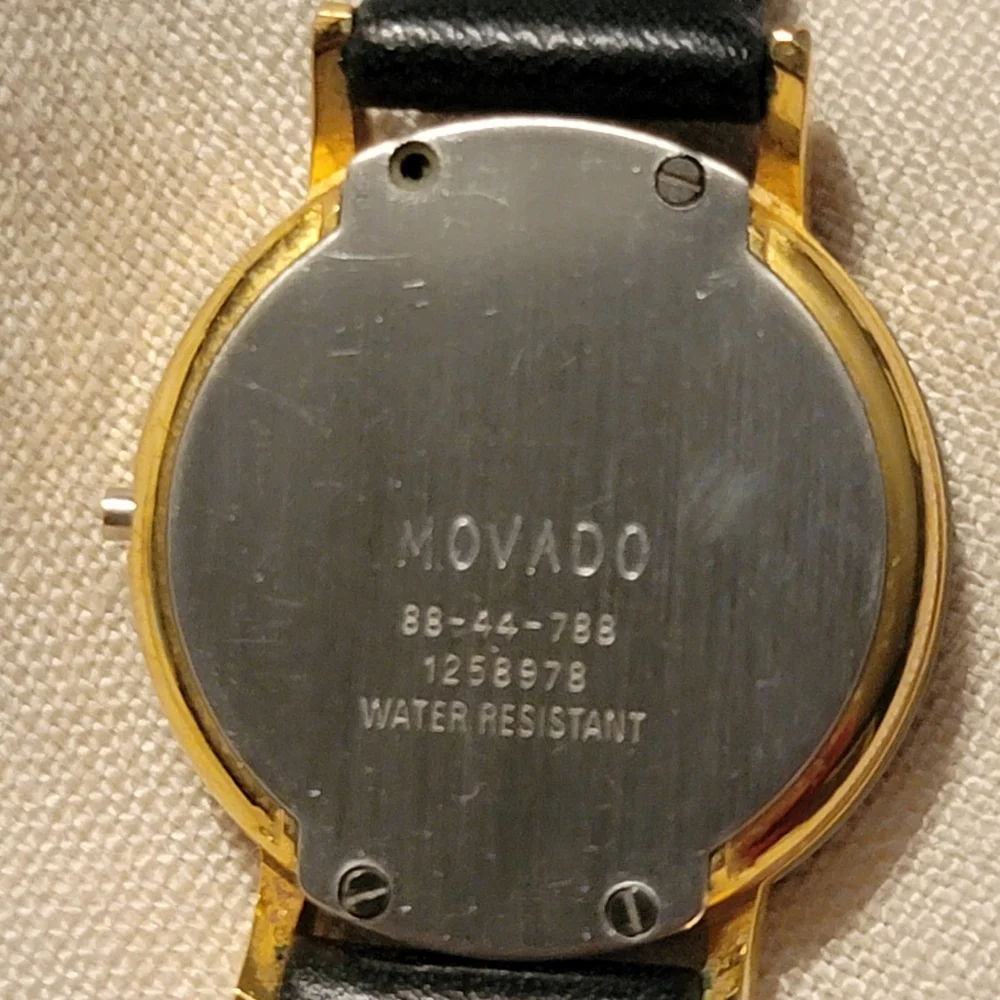 Movado Black and Gold Wearable Watch - Picture 10 of 10